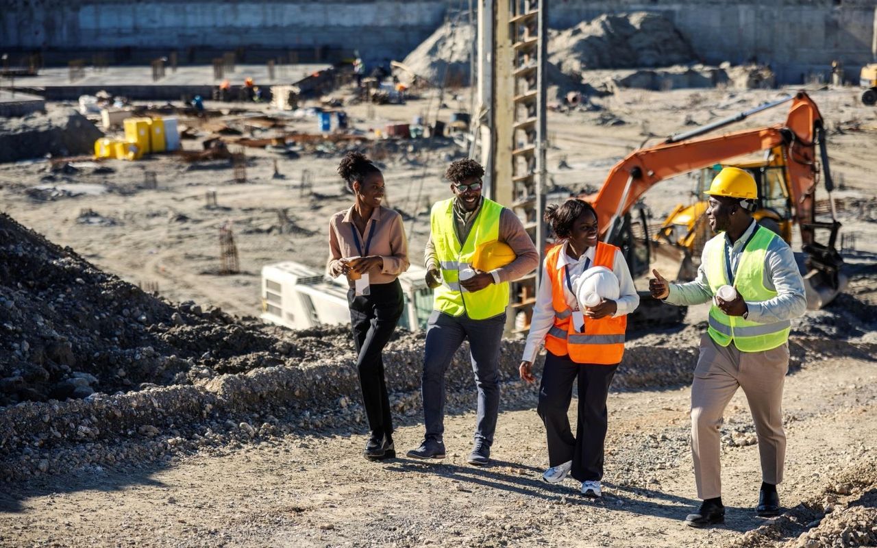 Construction team reviewing progress on site